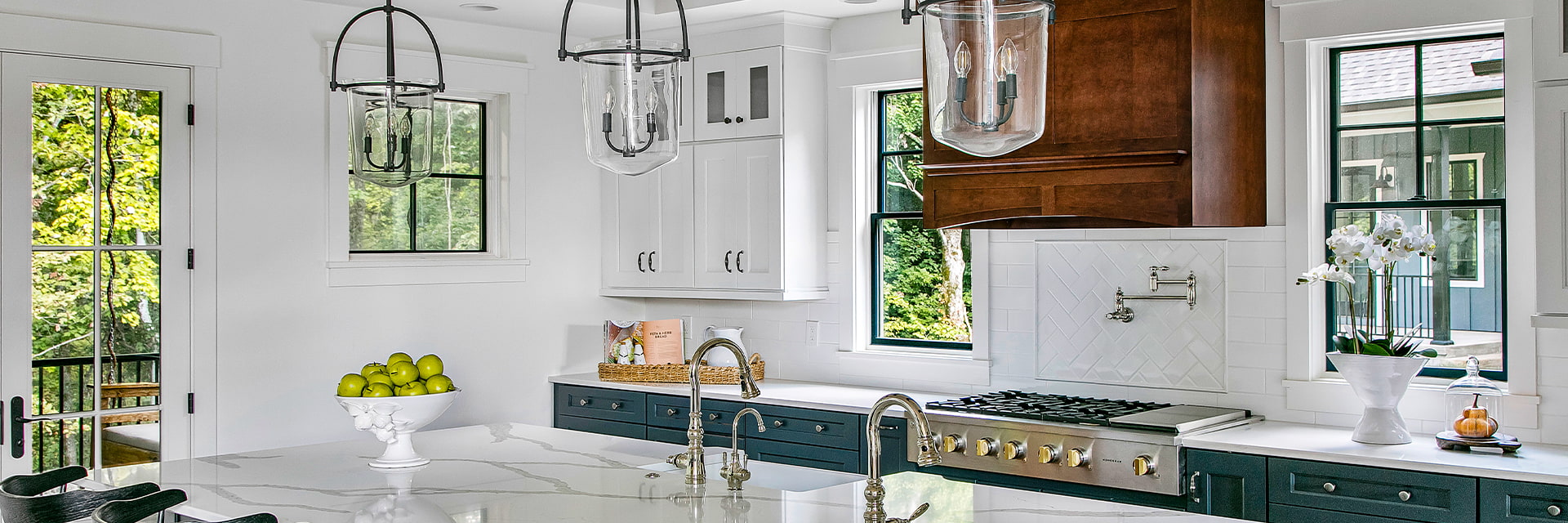 white kitchen marble counters black wood windows with grilles-between-the-glass