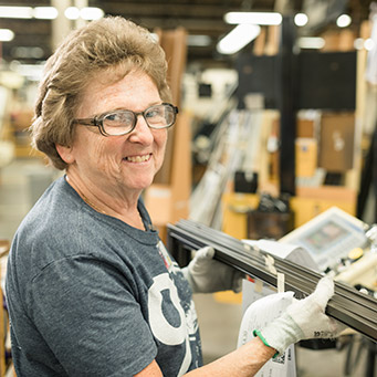 woman working in pella factory