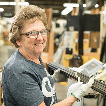 woman working in pella factory