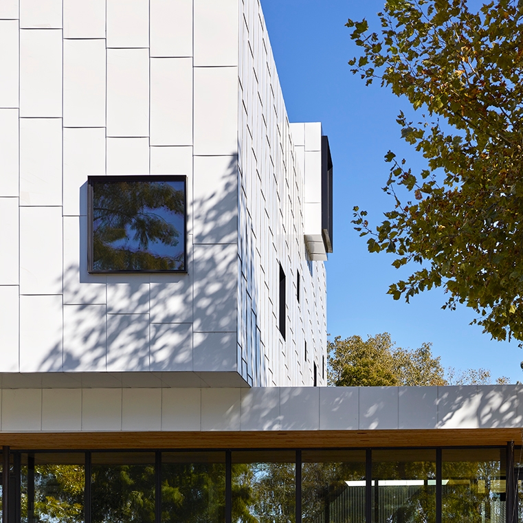 Closeup view of modern house in Memphis highlighting moisture-resistant clad windows.