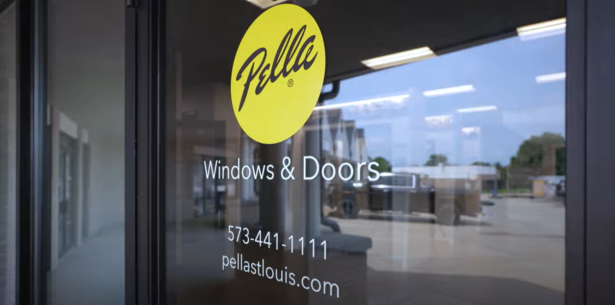 Door of Pella St. Louis showroom in Columbia with Pella logo in the middle.