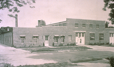 The original Pella manufacturing building located in Pella, Iowa, dated 1926.