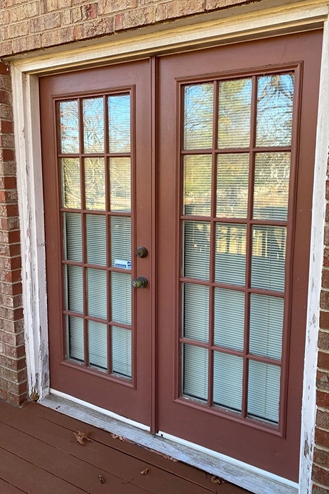 Outdated french patio doors on Nashville home. 