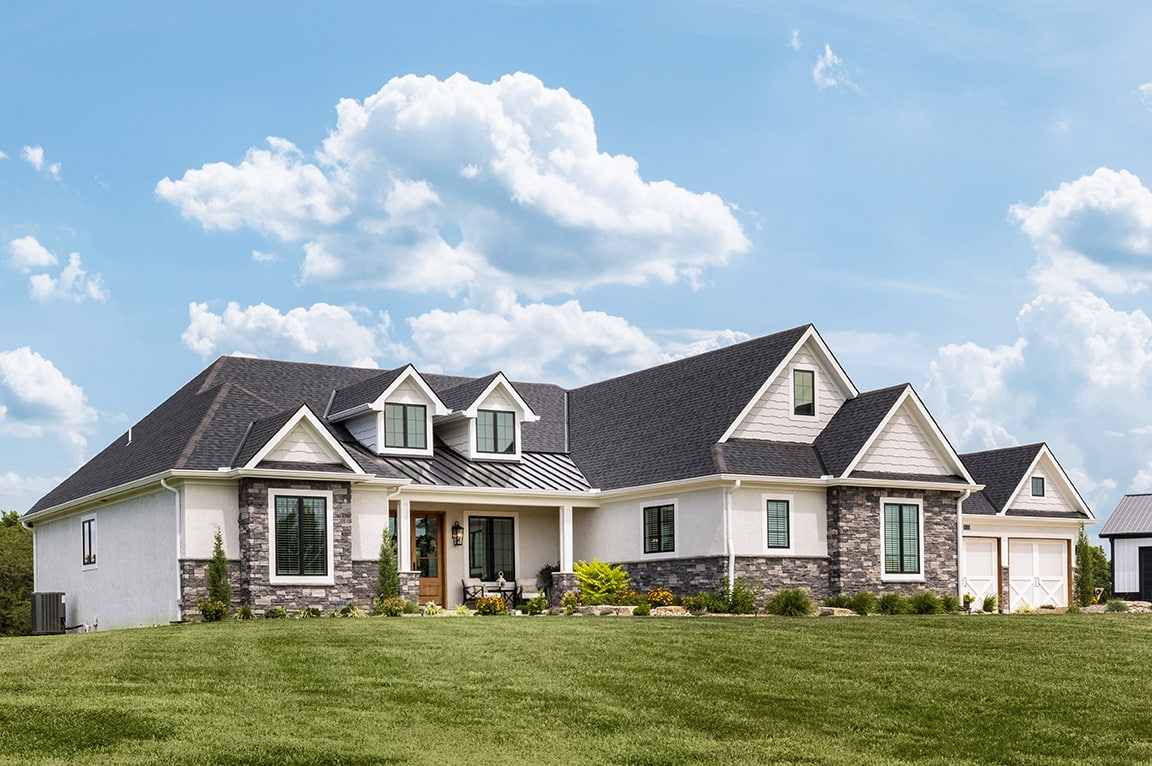 Modern farmhouse in Kansas City with black framed Pella windows.