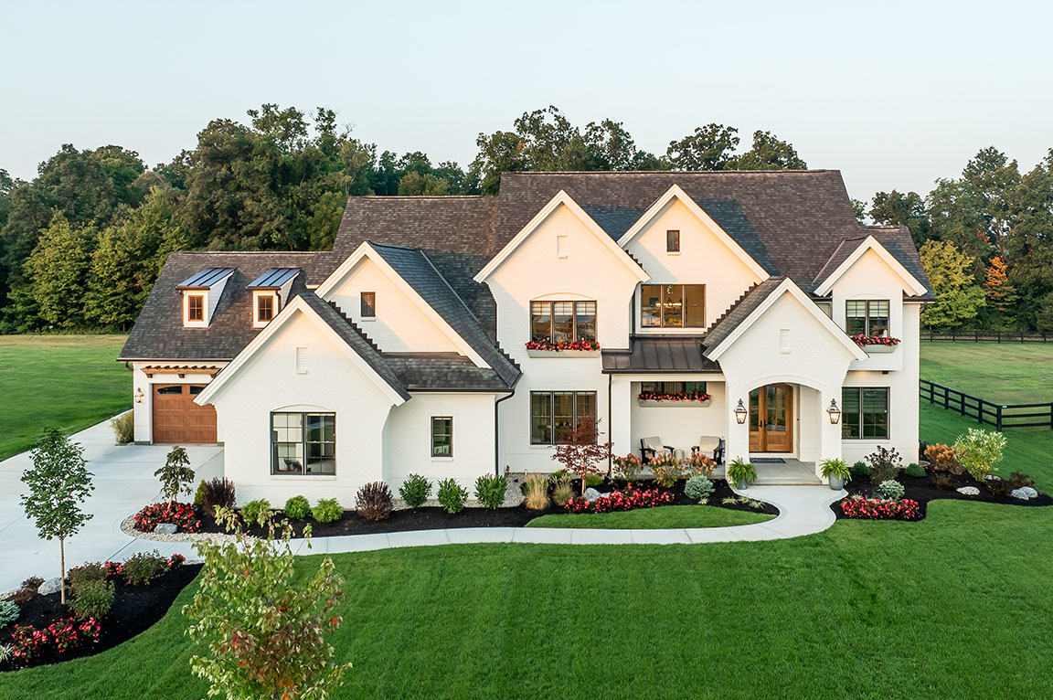 Elegant white home featuring Pella Reserve and Lifestyle windows