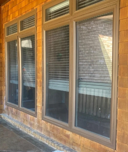 Front of Arlington home with outdated windows. 