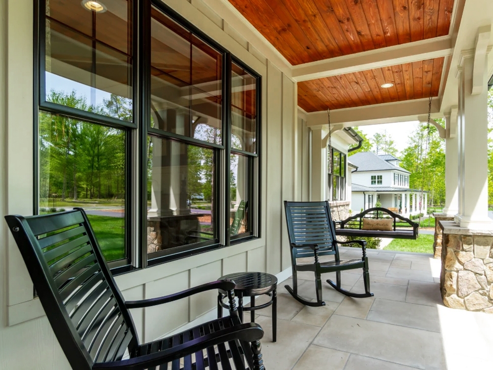 Black double-hung windows on modern farmhouse patio in Richmond. 