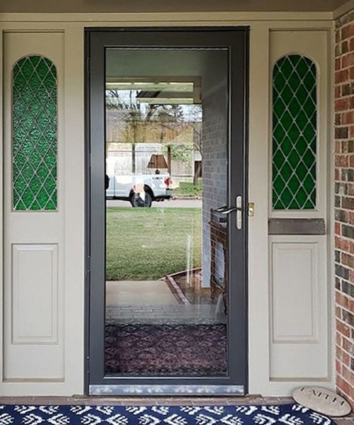 a full light storm door on an Oklahoma home exterior porch