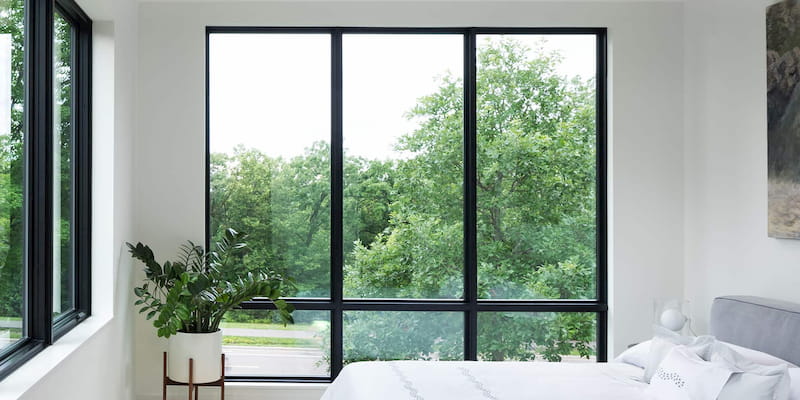 black trimmed fixed windows 3-wide