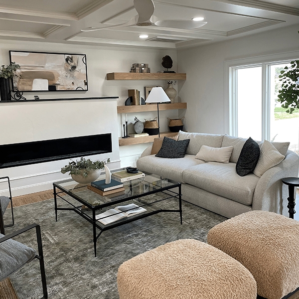 Living room interior with a white sliding patio door behind the couch