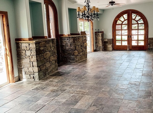 dining room before renovation - arched wood doors