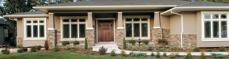 arched transom over an entry door with dual sidelights