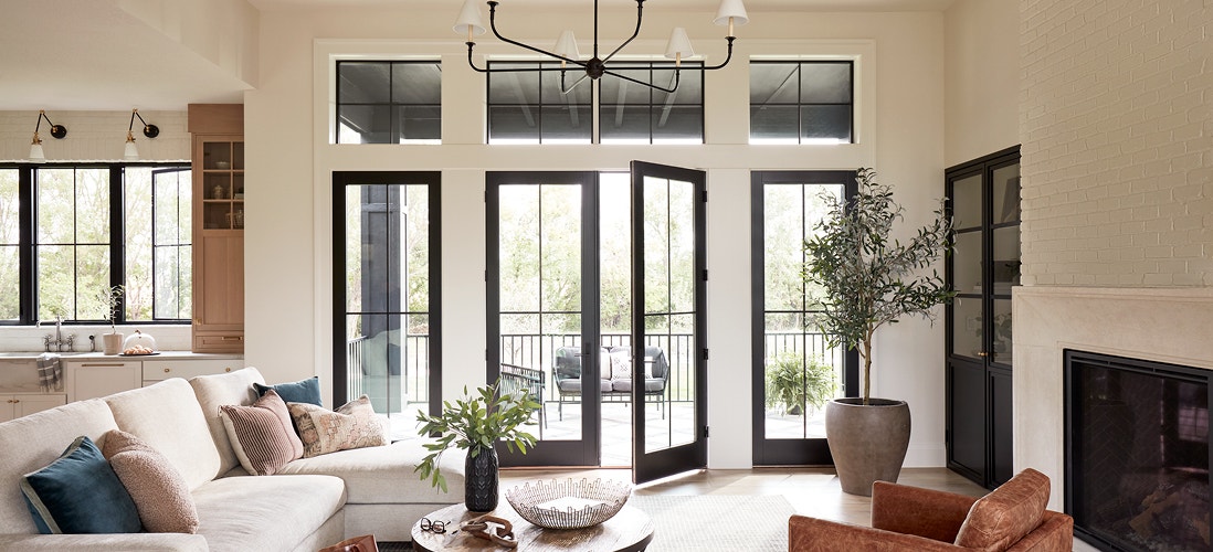 tan-colored living room with two-panel black lifestyle series french doors