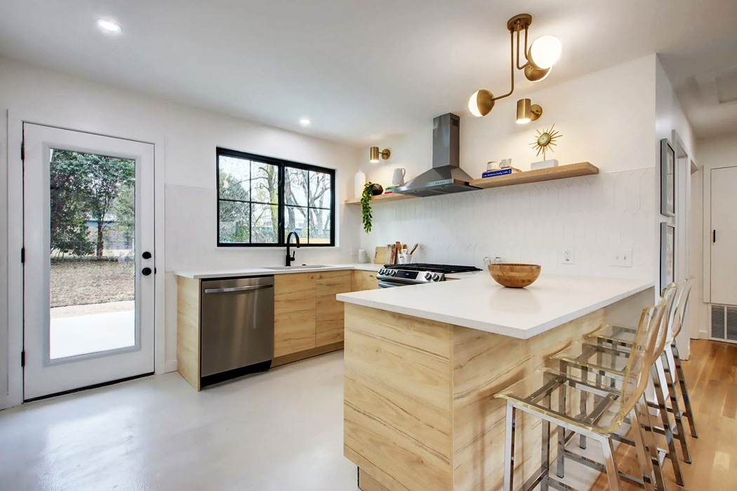Image of a Windsor Park kitchen highlighting newly installed black windows. 