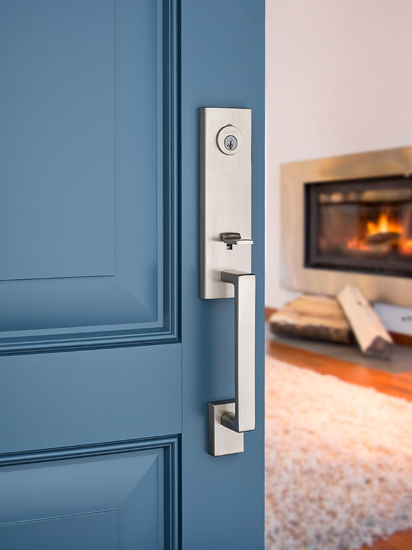Opened blue entry door with silver handle