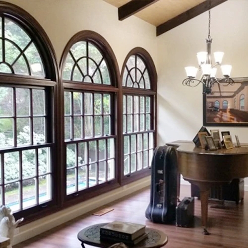 Interior view of San Jose home in custom arched double-hung windows.