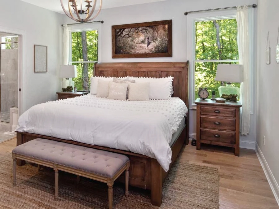 Oxford Farmhouse bedroom with newly installed wood clad windows.