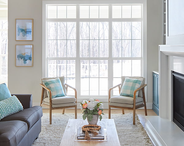 A three-wide configuration of single-hung windows, each with a simple transom overhead.