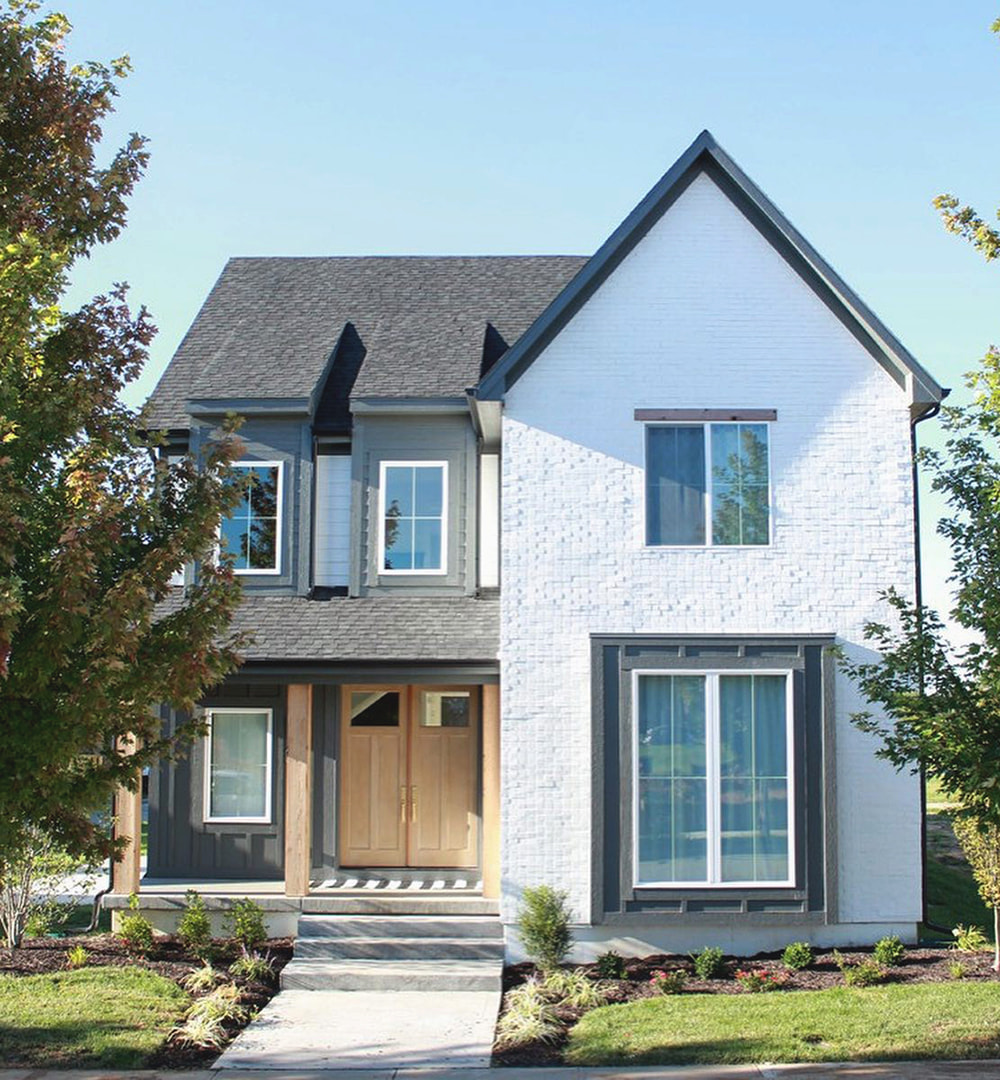 Modern Farmhouse Exterior with White Windows: Timeless Elegance Meets ...
