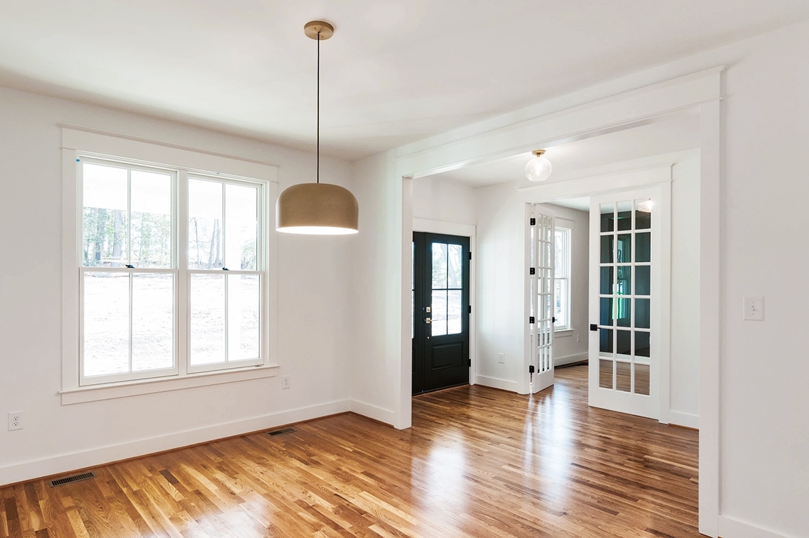 Newly built Midlothian home interior showing white windows and new doors.