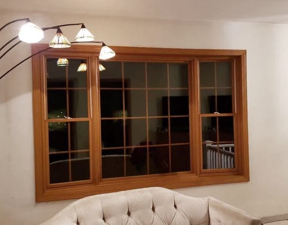 Interior of an Essex home living room highlighting wooden bay window.
