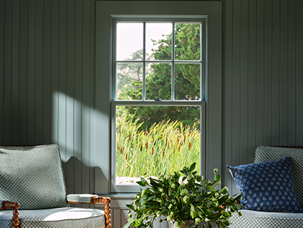 brick-walled kitchen with natural wood accents.
