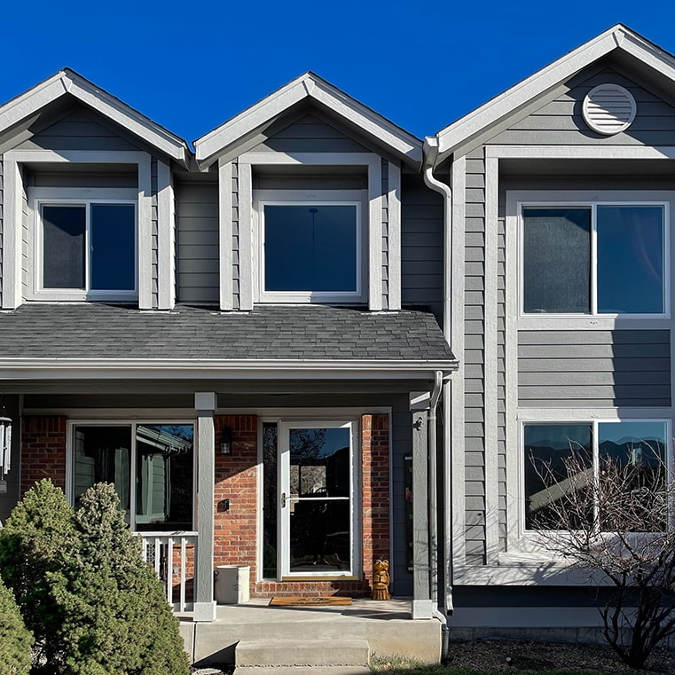 After white windows with no grille pattern in Colorado Springs.