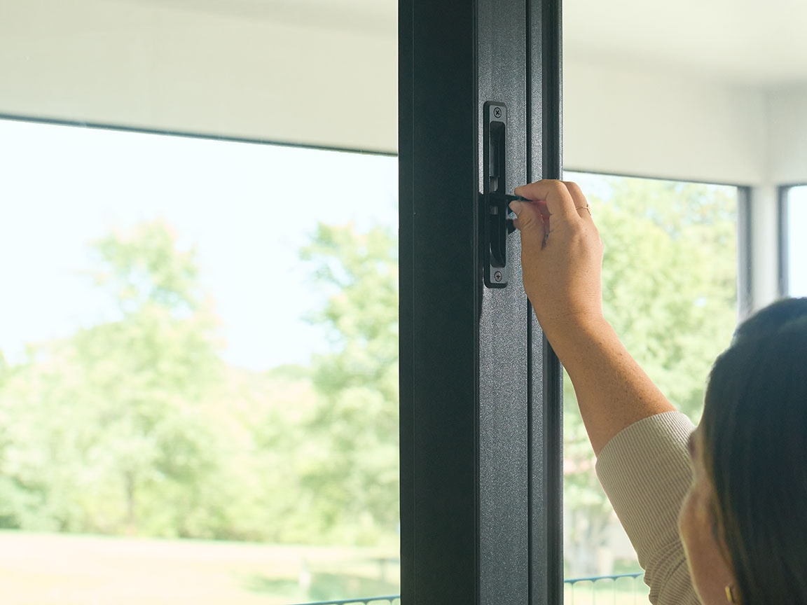 Hand locking sliding glass door handle.