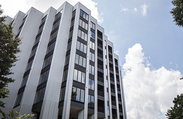 Passive House apartment building with multiple stories of Pella windows