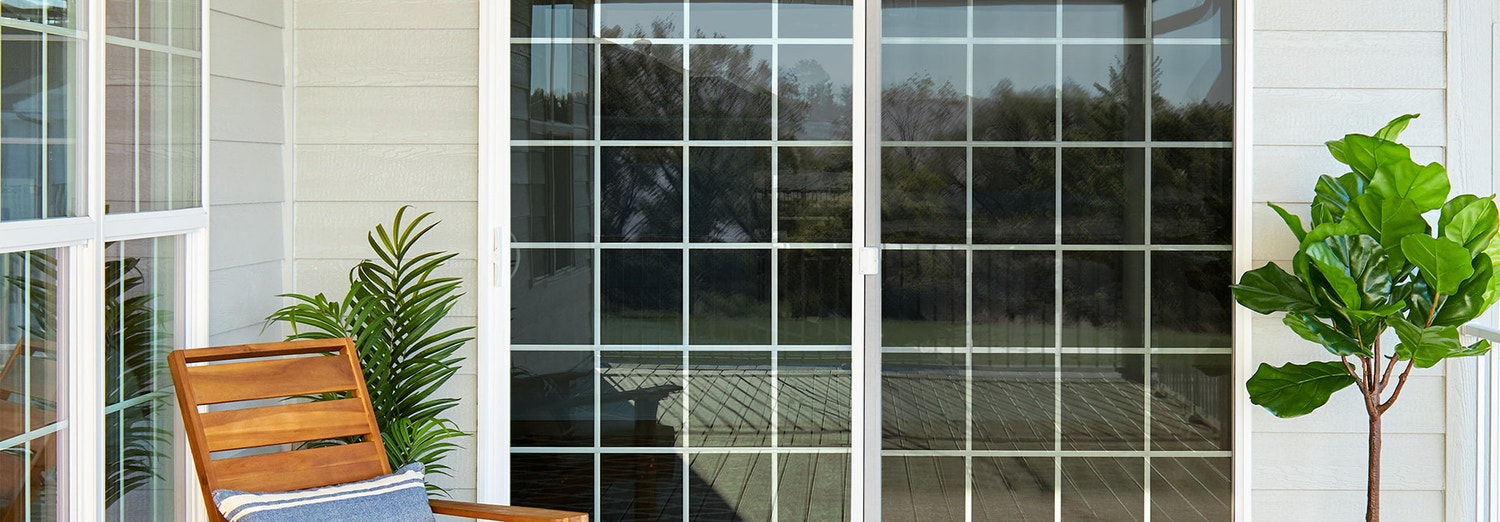 encompass by pella sliding patio door with two single-hung windows on each side