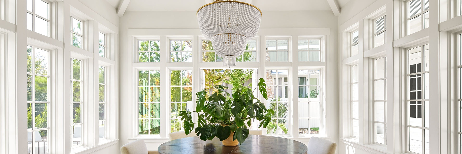 Beautiful Pella windows open up sunroom in home.