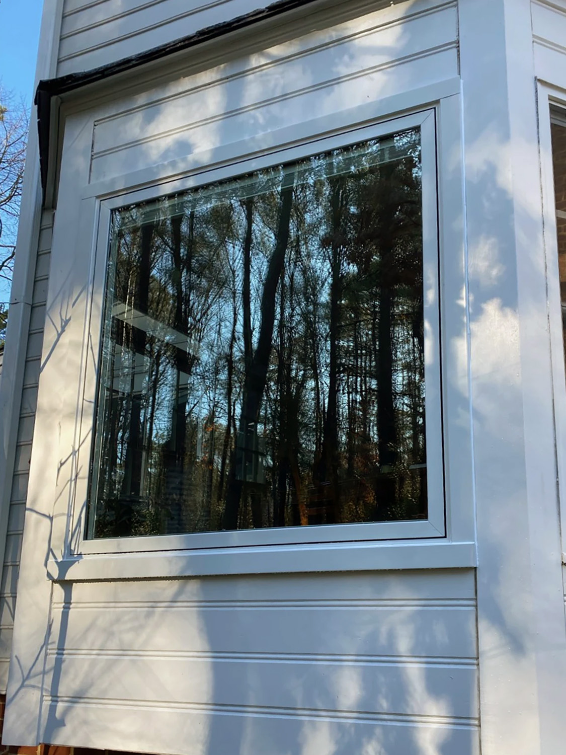 Exterior of Henrico home with newly installed Pella windows.