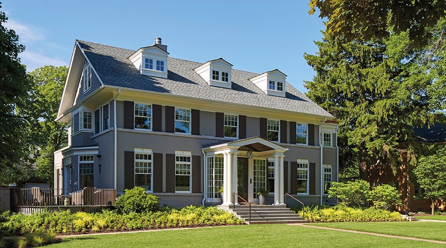 Black Windows With Black Trim Creates A Bold Focal Point