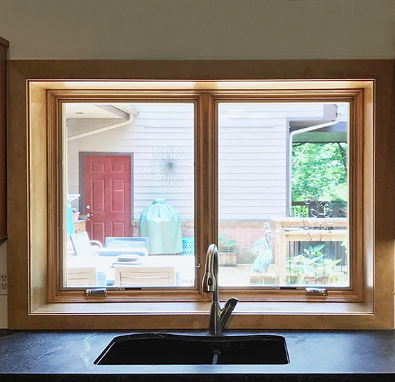 Newly installed Pella box bay wood casement windows in Mars kitchen.