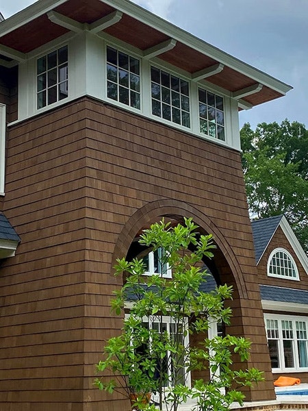 An expansive entryway featuring custom-grilled Reserve windows