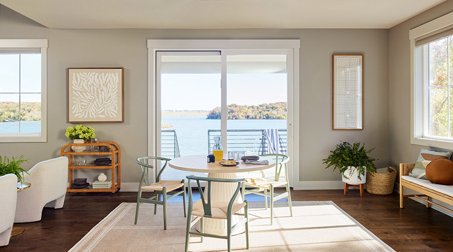 exterior shot of expansive sliding patio door with black trim