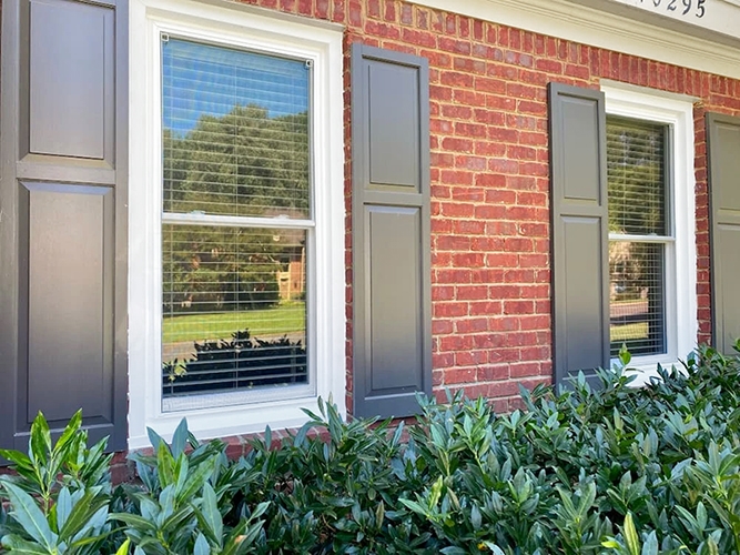 Updated vinyl window replacements on Collierville home improving curb appeal.