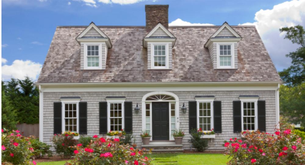 the before picture of a brick home that is going to be remodeled