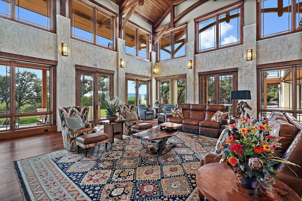 Grand room of Medina home with highlighting Pella wood windows.