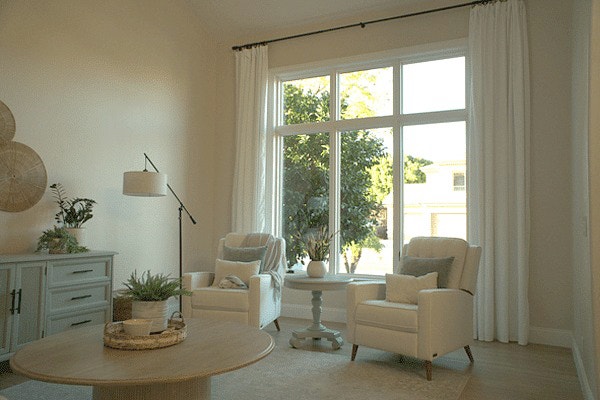 An Arizona-area home interior looking out through three casement windows
