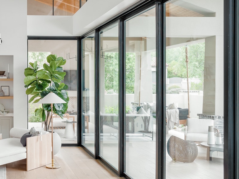 Interior view of the black patio doors around the edge of a modern home