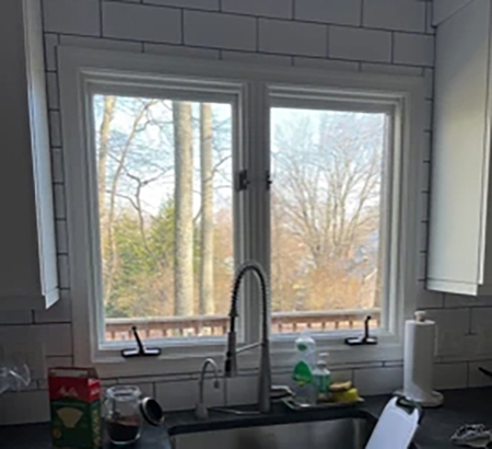 Sink in Garnet Valley kitchen home with outdated window.