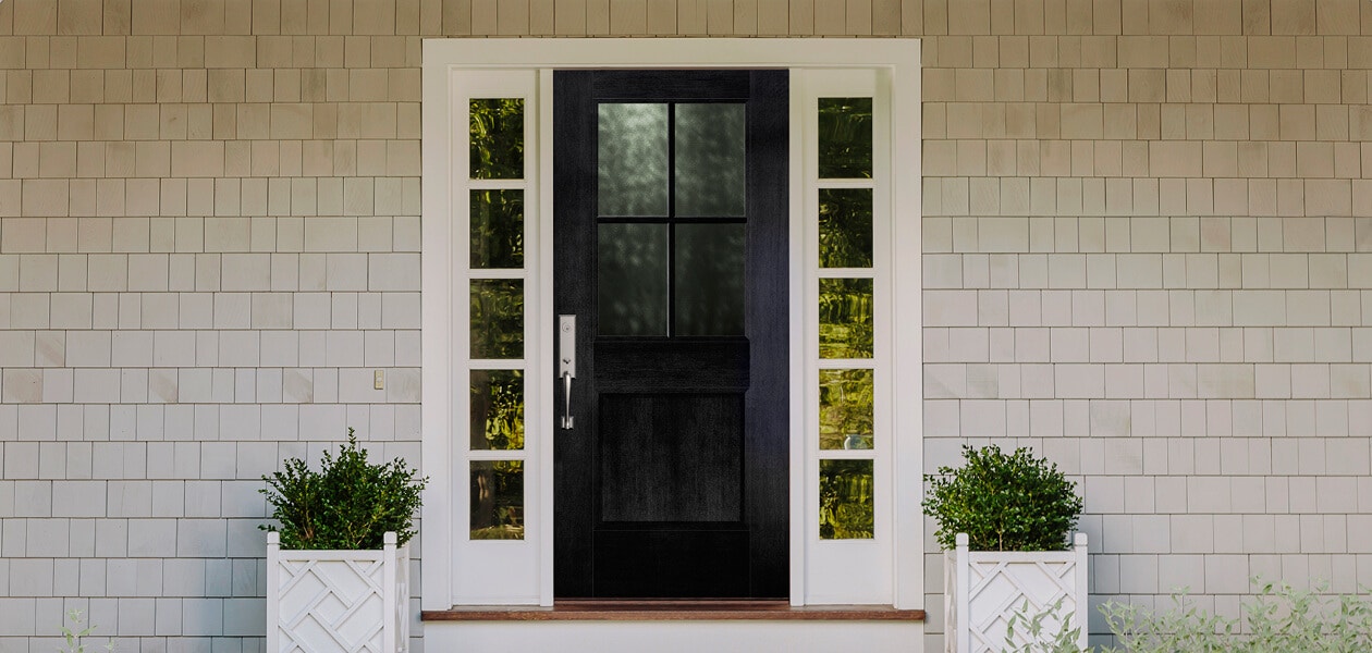 black stained half-light entry door with dual sidelights