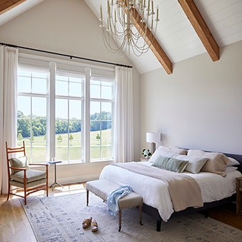 hang curtains made from heavy fabric to reduce noise