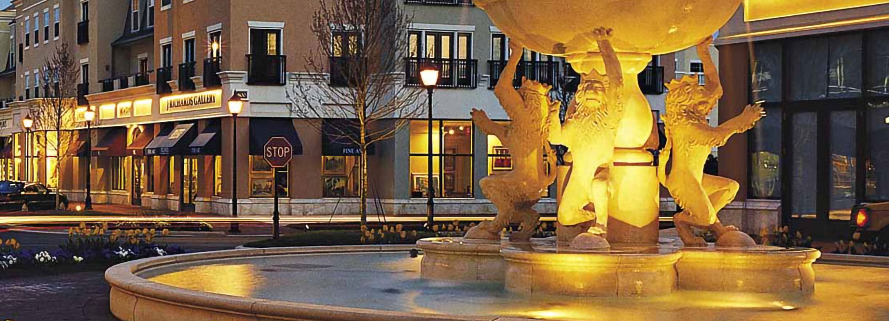 Philips Place fountain and storefronts.