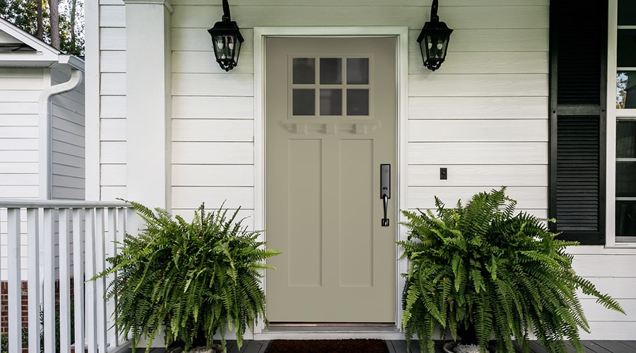Sage Front Entry Door of White Home