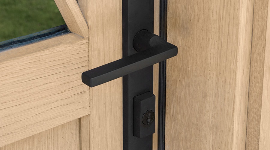 tight shot of hinged door with satin nickel hardware