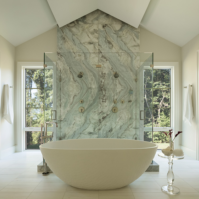 Modern Vienna bathroom with newly installed Pella casement windows. 