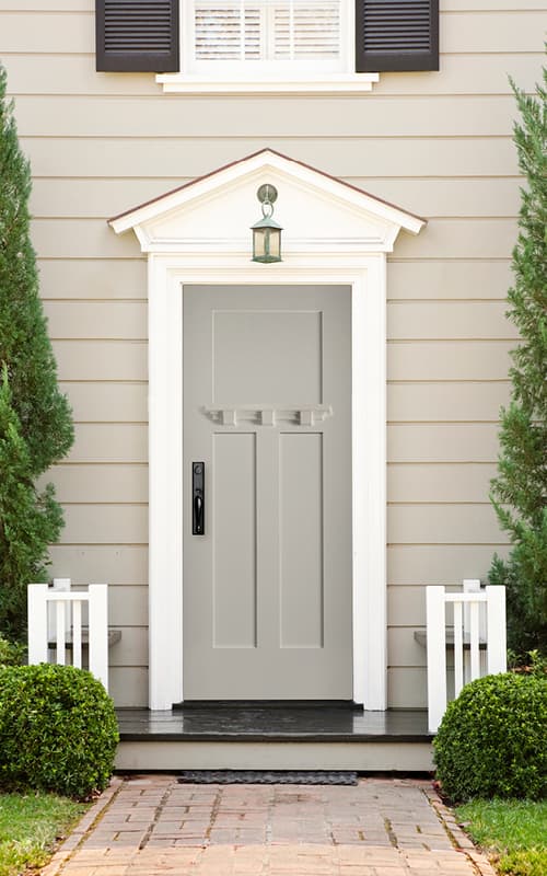 craftsman front door gray finish white decorative trim