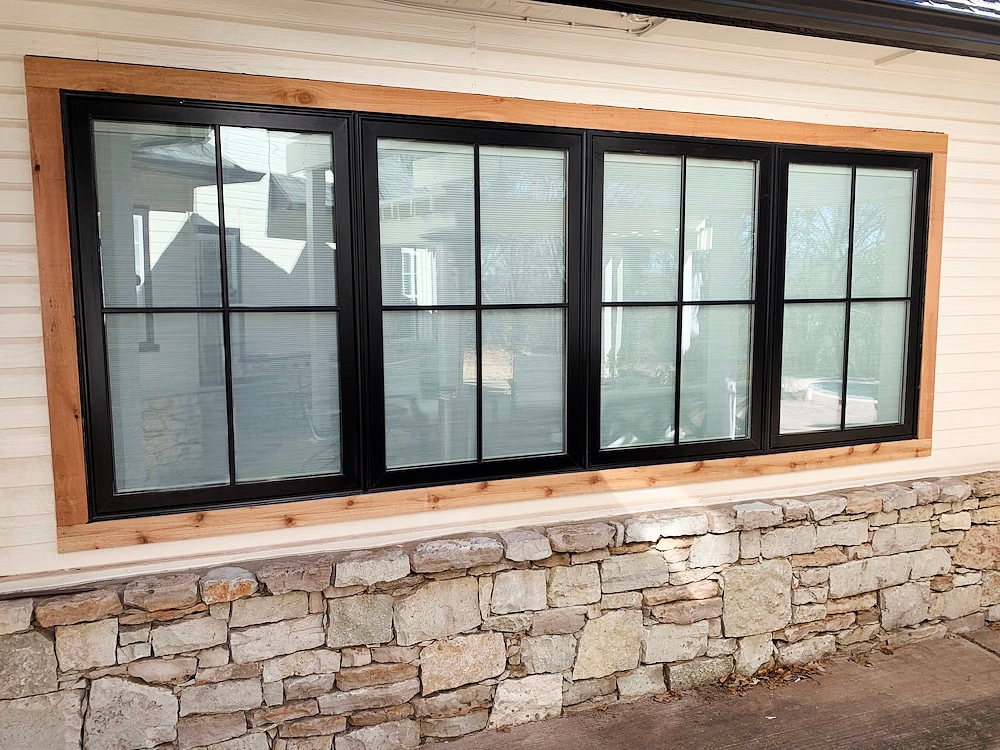 Closeup view of newly installed windows for garage suite conversion for Arcadia home. 